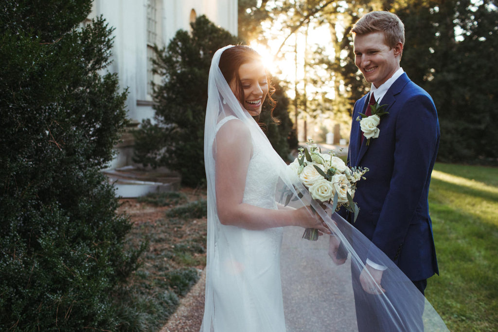 bride and groom smile softly after their intimate wedding ceremony in atlanta