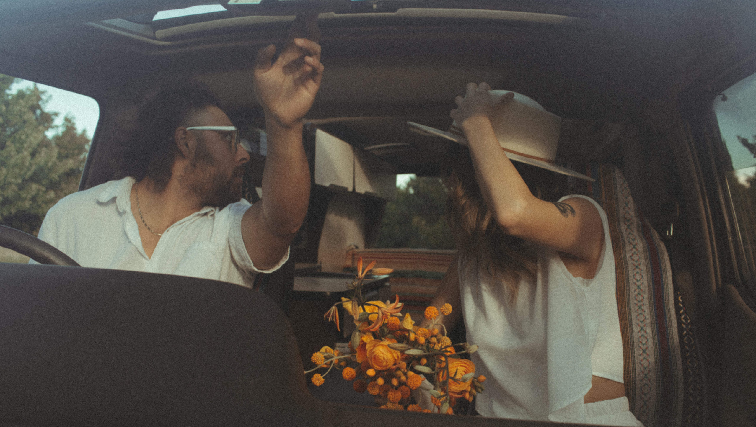 couple gets ready for a ride in their van