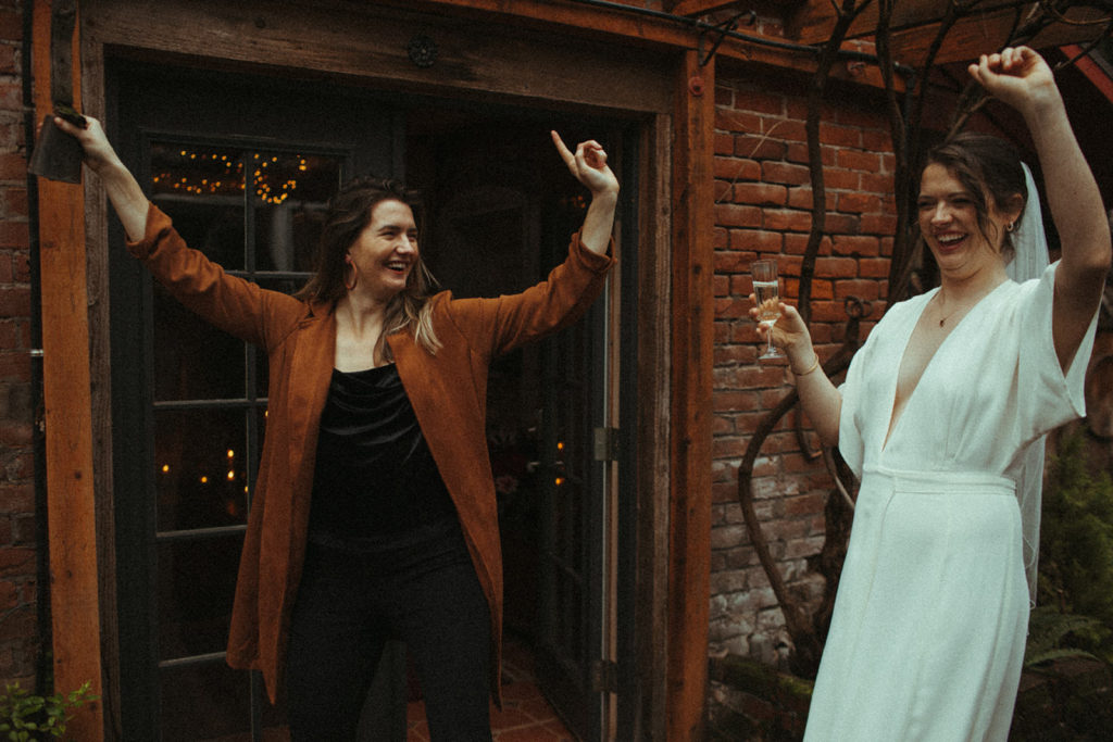 sisters sharing a dance after an intimate elopement at the ruby june inn in white salmon