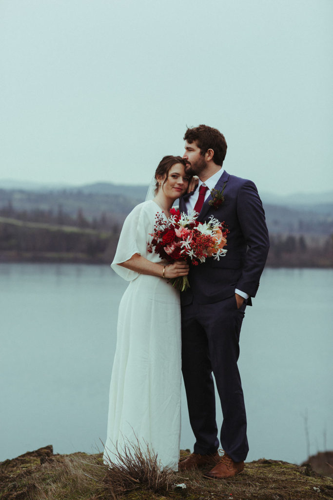 couple posing for wedding photos in the columbia river gorge