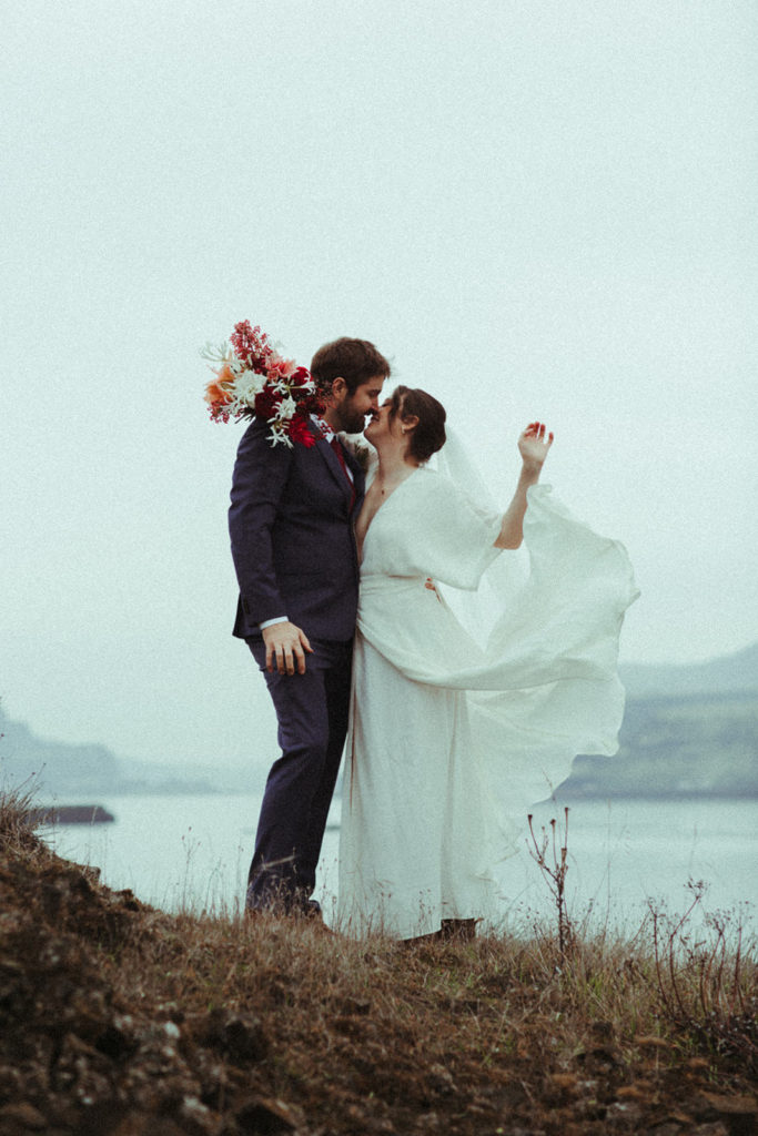 couple posing for wedding photos in the columbia river gorge