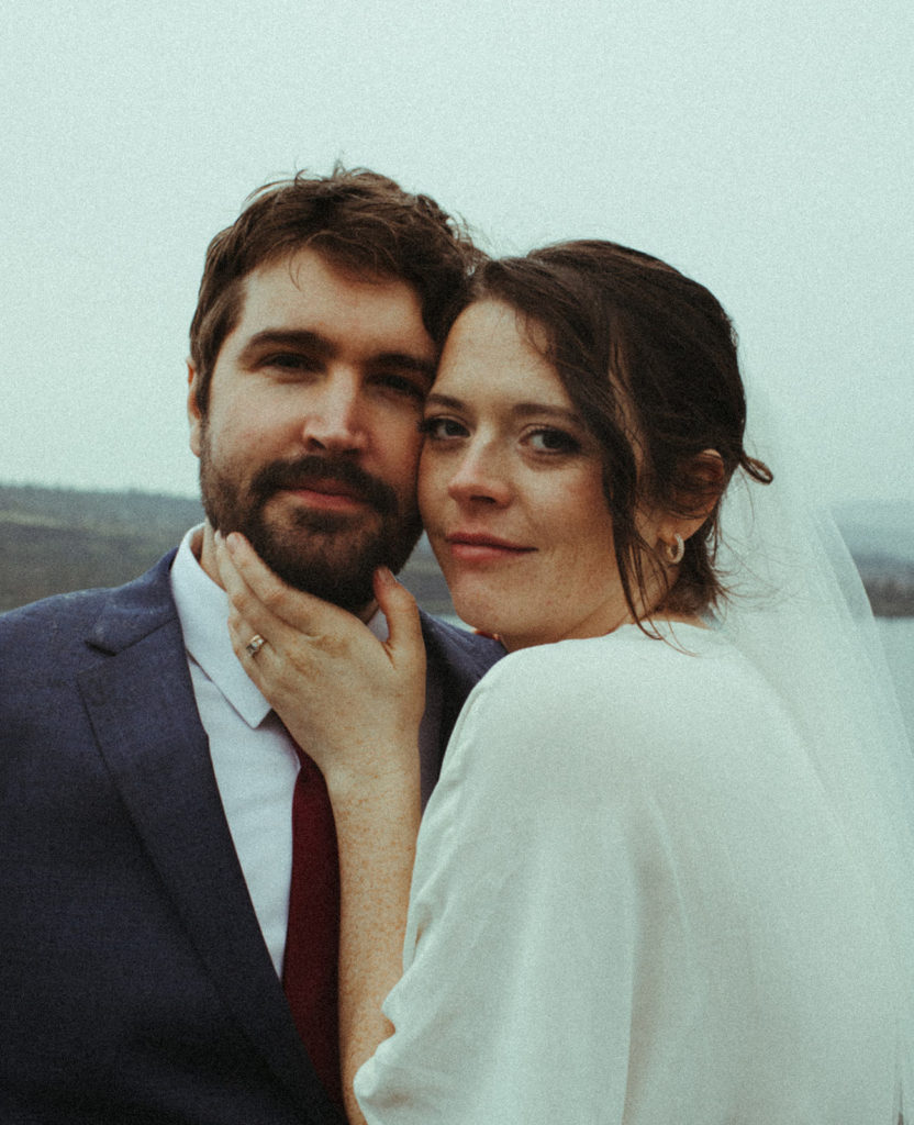 couple posing for wedding photos in the columbia river gorge