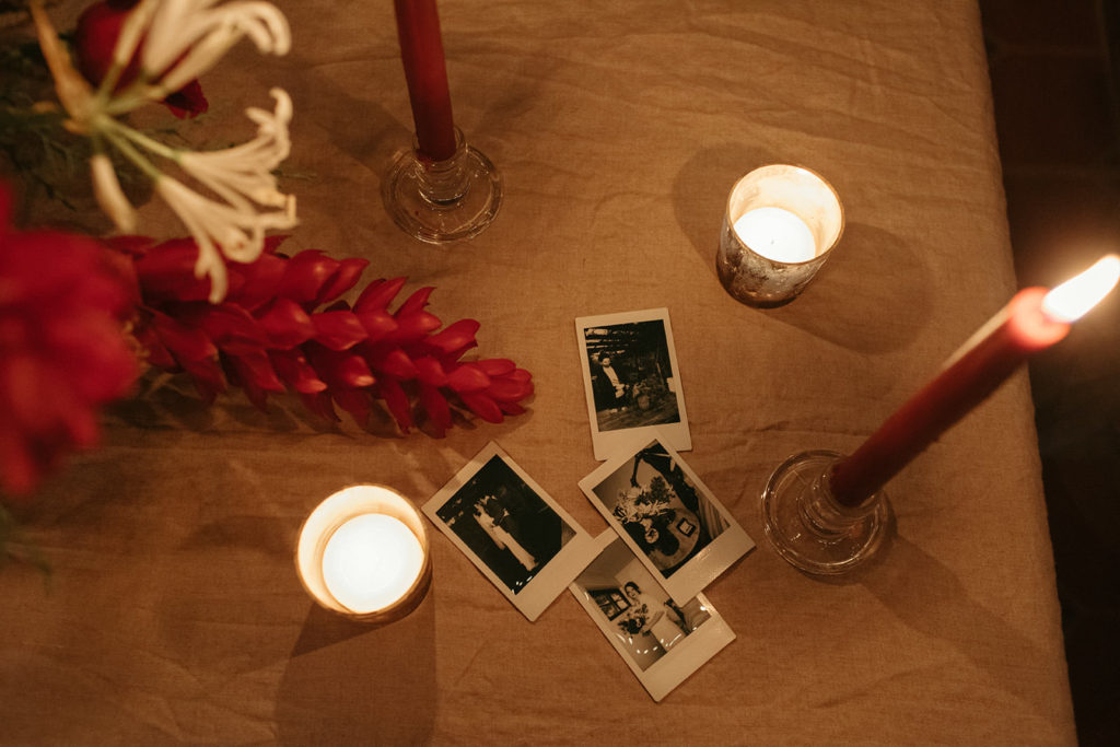 polaroid wedding photos on the table