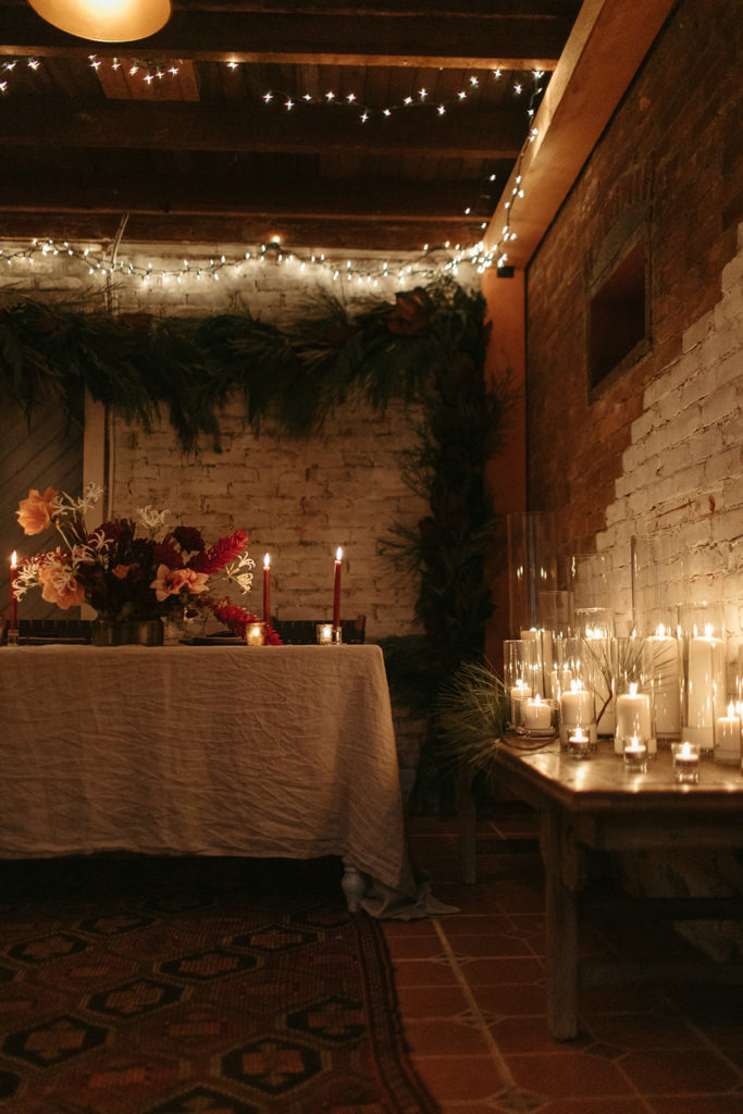 an intimate dinner set up with candles at the ruby june inn
