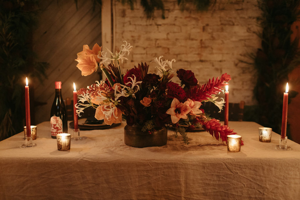 an intimate dinner set up with candles at the ruby june inn