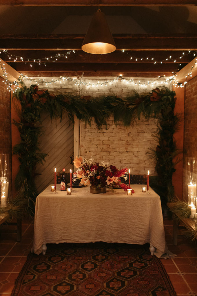 an intimate dinner set up with candles at the ruby june inn