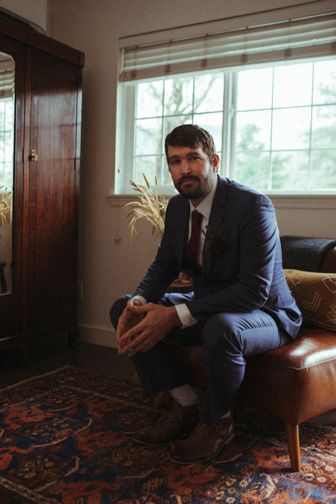 a groom moments before his wedding